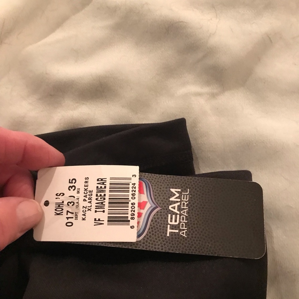 New with tags NFL Green Bay Packets 1/4 zip pull over.